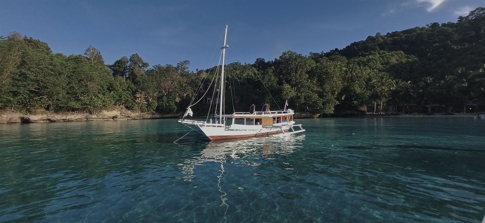The Togean Safari Cruise phinisi under way
